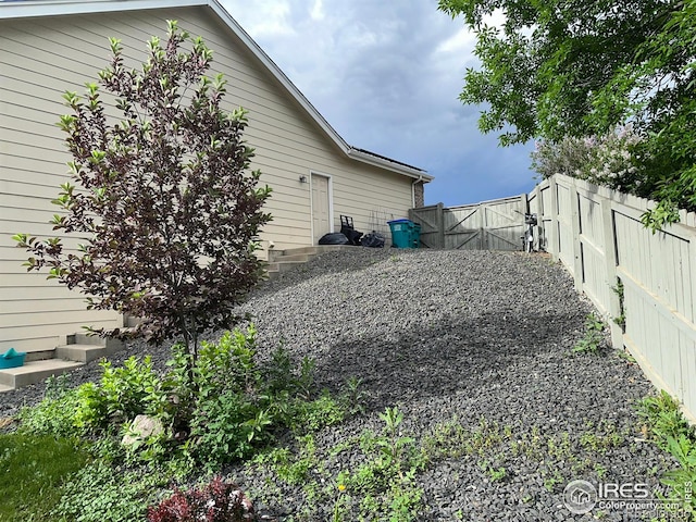 205 Timber Ridge Ct, Severance, CO 80550 - view of yard featuring a gate