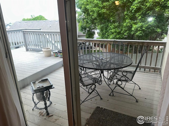 205 Timber Ridge Ct, Severance, CO 80550 - deck featuring outdoor dining space
