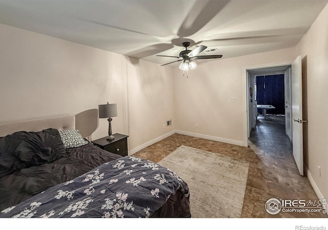 5004 Fox Hill Dr, Longmont, CO 80504 - bedroom with ceiling fan and baseboards