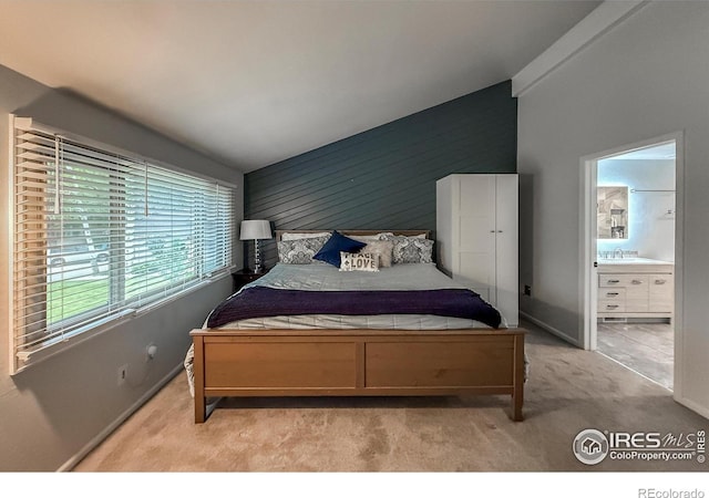 5004 Fox Hill Dr, Longmont, CO 80504 - bedroom with light carpet and ensuite bath