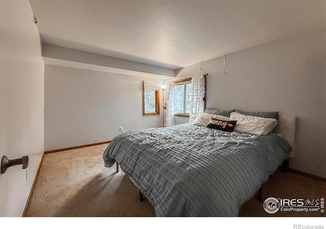 5004 Fox Hill Dr, Longmont, CO 80504 - carpeted bedroom with baseboards
