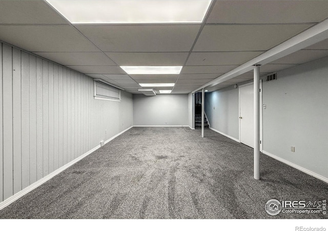 5004 Fox Hill Dr, Longmont, CO 80504 - finished basement with carpet, stairway, and a paneled ceiling