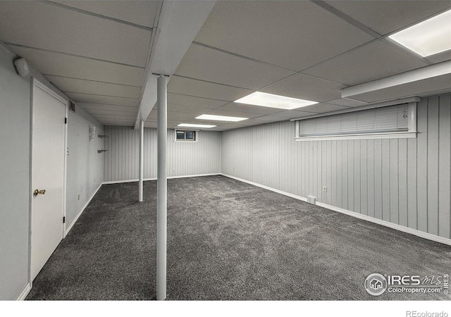 5004 Fox Hill Dr, Longmont, CO 80504 - finished below grade area with carpet flooring and a paneled ceiling
