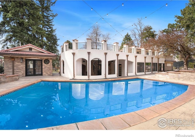 2111 E Alameda Ave, Denver, CO 80209 - swimming pool featuring french doors and a patio area