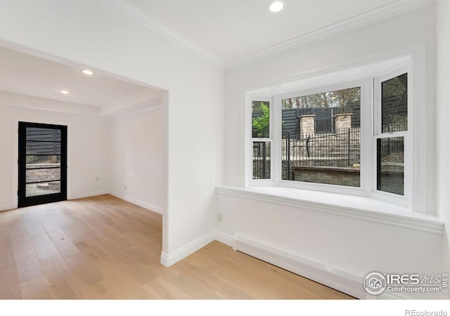 2111 E Alameda Ave, Denver, CO 80209 - spare room with light wood-type flooring, ornamental molding, and recessed lighting