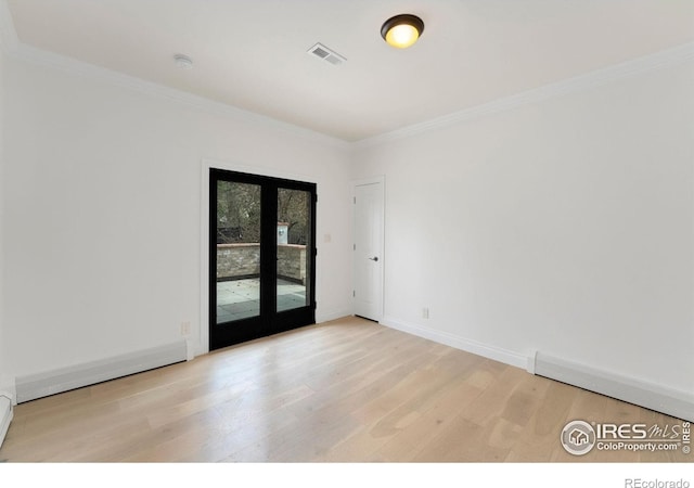 2111 E Alameda Ave, Denver, CO 80209 - unfurnished room featuring french doors, crown molding, and wood finished floors