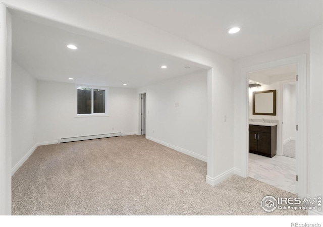 2111 E Alameda Ave, Denver, CO 80209 - carpeted spare room featuring a baseboard radiator and recessed lighting