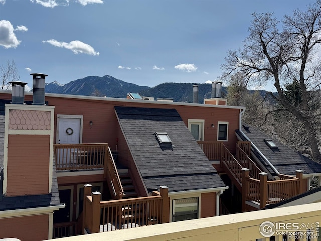 3025 Broadway St Unit 17, Boulder, CO 80304 - rear view of property with stairs and a mountain view