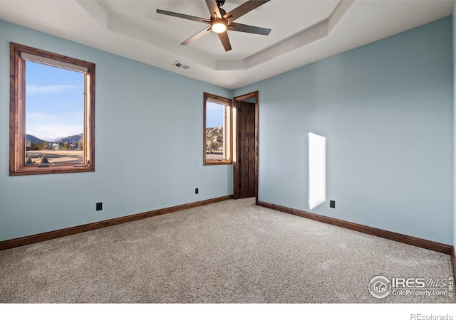 1740 N Ridge Ln, Estes Park, CO 80517 - carpeted spare room with a raised ceiling and ceiling fan