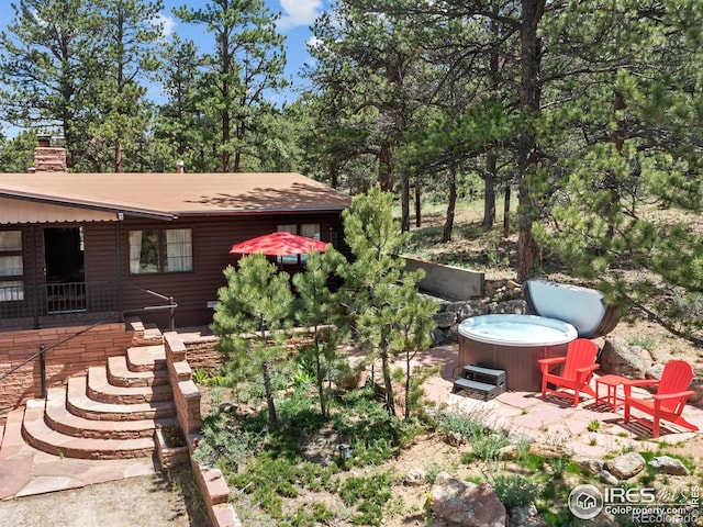 1650 Powelly Ln, Estes Park, CO 80517 - view of yard featuring a hot tub and a patio