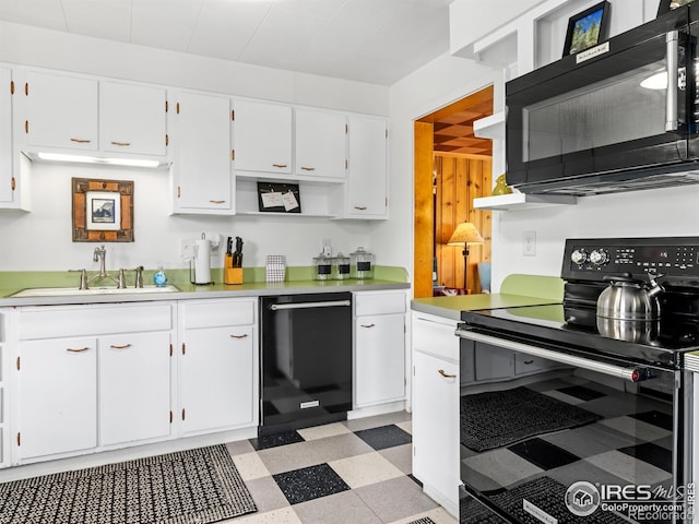 1650 Powelly Ln, Estes Park, CO 80517 - kitchen with black appliances, light floors, white cabinets, and light countertops