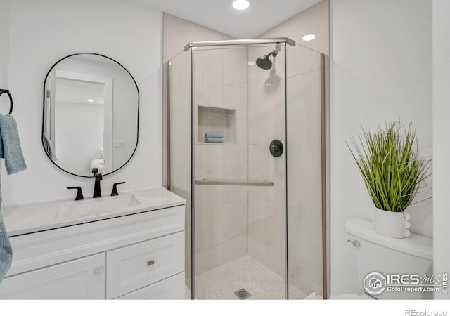 7826 Joan Dr, Denver, CO 80221 - full bath featuring vanity, a shower stall, and recessed lighting