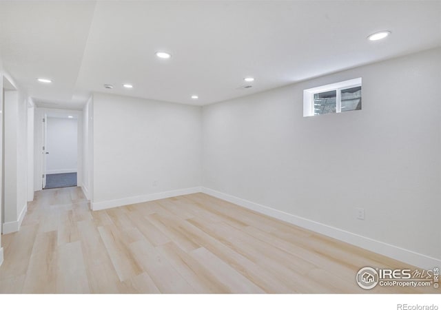 7826 Joan Dr, Denver, CO 80221 - below grade area with light wood-type flooring and recessed lighting