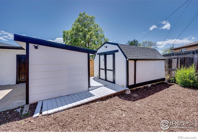 7826 Joan Dr, Denver, CO 80221 - back of property featuring a shed