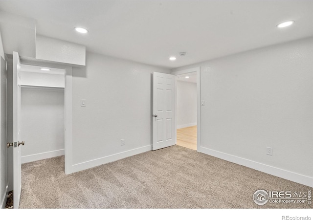 7826 Joan Dr, Denver, CO 80221 - unfurnished bedroom with carpet floors, recessed lighting, and a spacious closet
