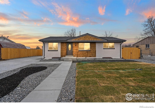 9230 Aspen Dr, Thornton, CO 80229 - bungalow-style house with a gate and brick siding