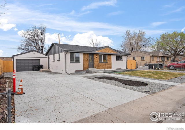 9230 Aspen Dr, Thornton, CO 80229 - ranch-style house with a detached garage, an outdoor structure, and brick siding