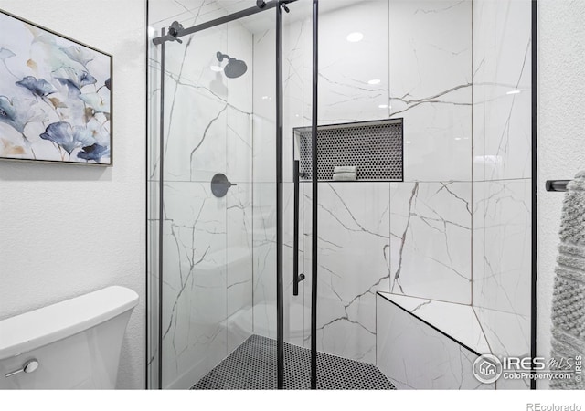 9230 Aspen Dr, Thornton, CO 80229 - bathroom featuring a marble finish shower