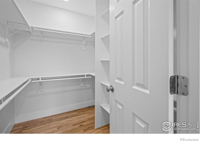 9230 Aspen Dr, Thornton, CO 80229 - walk in closet featuring light wood finished floors