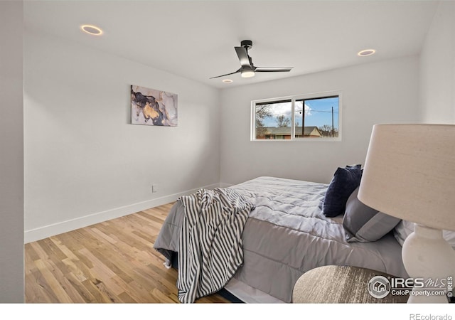 9230 Aspen Dr, Thornton, CO 80229 - bedroom with wood finished floors, ceiling fan, and recessed lighting