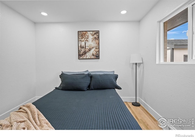 9230 Aspen Dr, Thornton, CO 80229 - bedroom featuring wood finished floors and recessed lighting