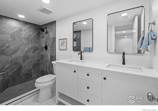 9230 Aspen Dr, Thornton, CO 80229 - full bath featuring double vanity, recessed lighting, and tiled shower