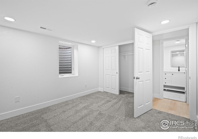 9230 Aspen Dr, Thornton, CO 80229 - unfurnished bedroom featuring carpet, recessed lighting, and a closet