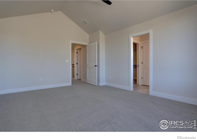 961 Eldorado Ln, Louisville, CO 80027 - unfurnished bedroom with light carpet, lofted ceiling, and ceiling fan