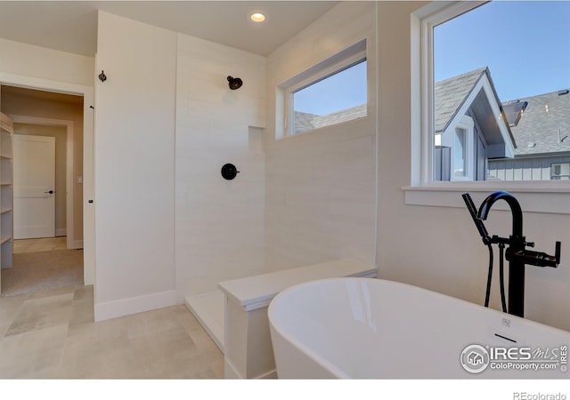 961 Eldorado Ln, Louisville, CO 80027 - full bathroom featuring a freestanding tub, a tile shower, and recessed lighting