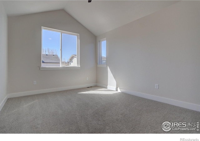 961 Eldorado Ln, Louisville, CO 80027 - spare room with carpet flooring and vaulted ceiling