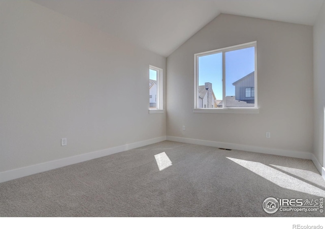 961 Eldorado Ln, Louisville, CO 80027 - unfurnished room with carpet flooring and vaulted ceiling