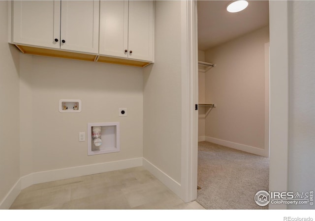 961 Eldorado Ln, Louisville, CO 80027 - laundry room with cabinet space, hookup for a washing machine, hookup for an electric dryer, and light colored carpet
