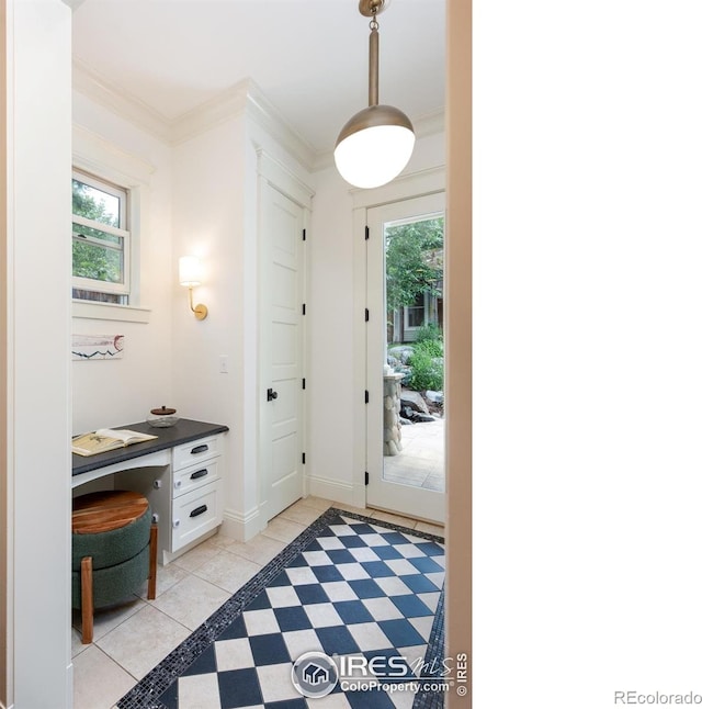 512 Marine St, Boulder, CO 80302 - foyer entrance with healthy amount of natural light, light tile patterned floors, and ornamental molding