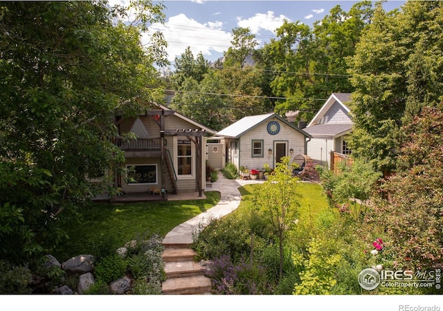 512 Marine St, Boulder, CO 80302 - view of front of property with a front yard, a patio area, and an outdoor structure