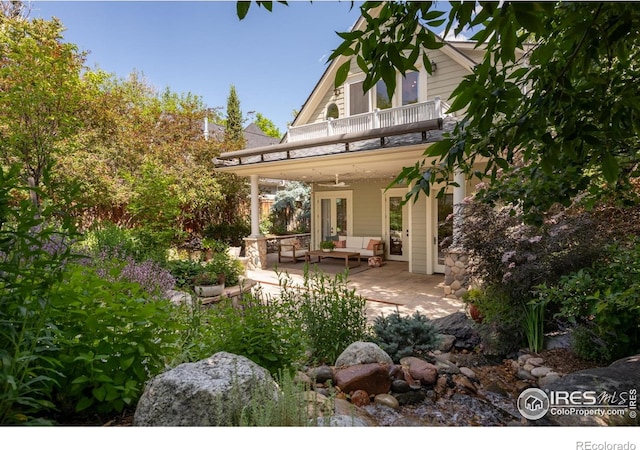 512 Marine St, Boulder, CO 80302 - rear view of house featuring a balcony, a patio area, and an outdoor hangout area
