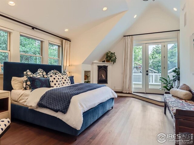 512 Marine St, Boulder, CO 80302 - bedroom with vaulted ceiling, access to outside, wood finished floors, and recessed lighting