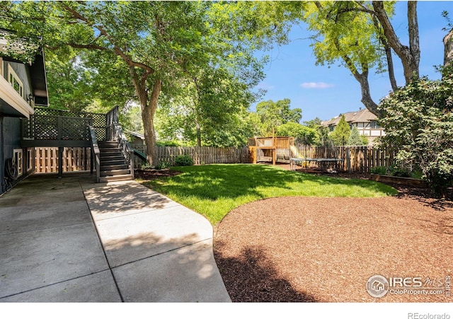2213 Hiawatha Ct, Fort Collins, CO 80525 - fenced backyard with a playground and stairway