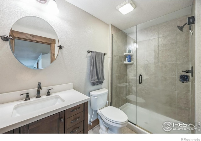 1897 Holloway Dr, Windsor, CO 80550 - full bath with vanity, a shower stall, and a textured wall