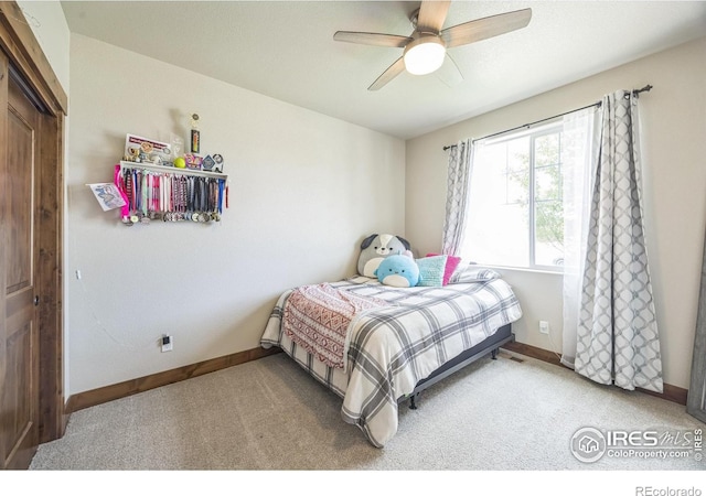 1897 Holloway Dr, Windsor, CO 80550 - carpeted bedroom featuring baseboards and ceiling fan