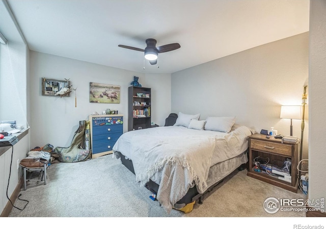 1897 Holloway Dr, Windsor, CO 80550 - carpeted bedroom with a ceiling fan