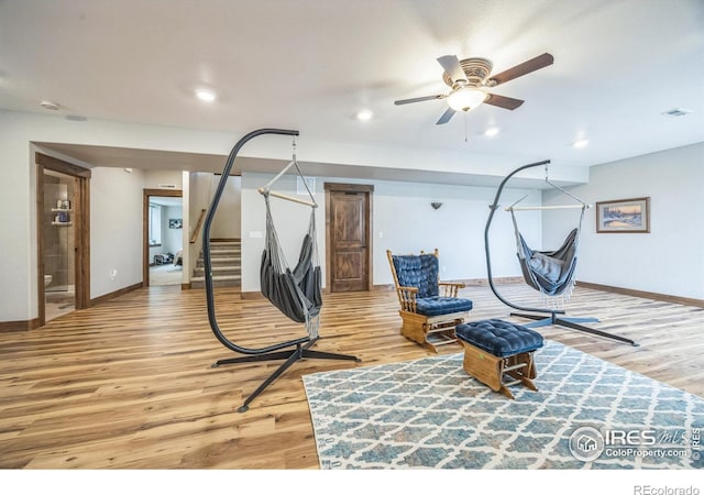 1897 Holloway Dr, Windsor, CO 80550 - exercise area featuring light wood-type flooring, recessed lighting, and ceiling fan
