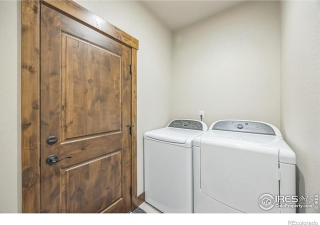 1897 Holloway Dr, Windsor, CO 80550 - laundry room featuring independent washer and dryer