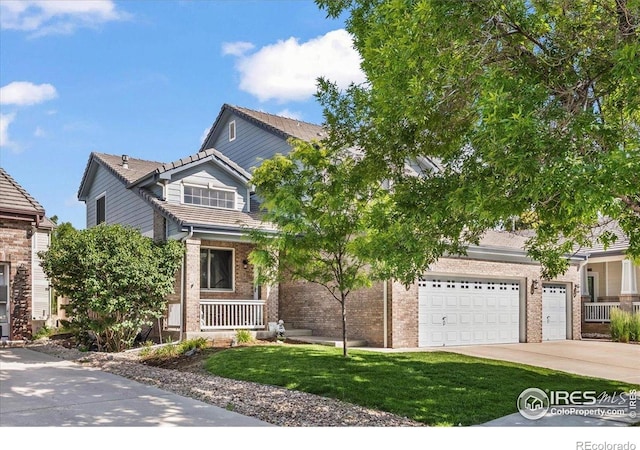 11861 Fairplay St, Commerce City, CO 80603 - view of property hidden behind natural elements featuring concrete driveway, a tiled roof, brick siding, a front lawn, and a garage