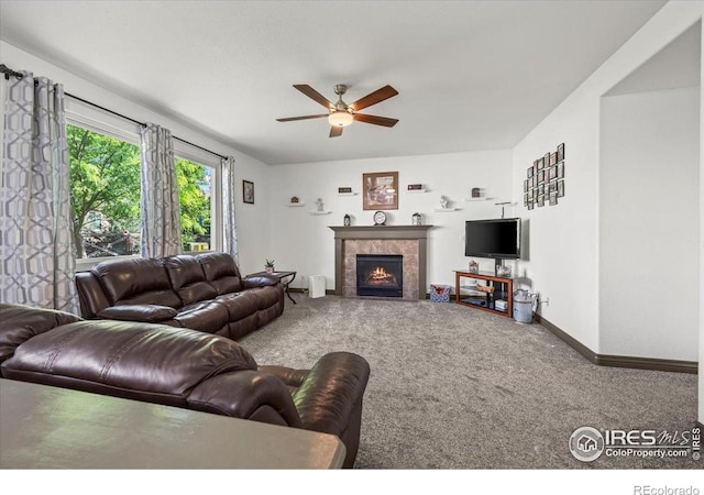 11861 Fairplay St, Commerce City, CO 80603 - carpeted living room with ceiling fan and a fireplace