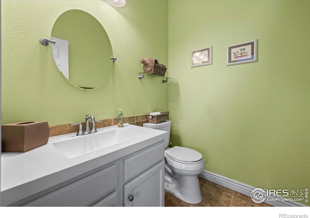 11861 Fairplay St, Commerce City, CO 80603 - bathroom with vanity and tile patterned flooring