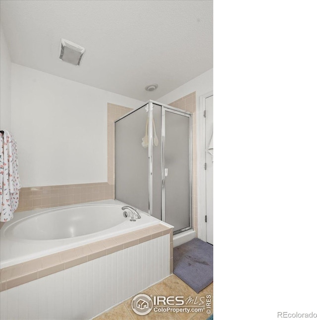 11861 Fairplay St, Commerce City, CO 80603 - full bath with a garden tub and a stall shower