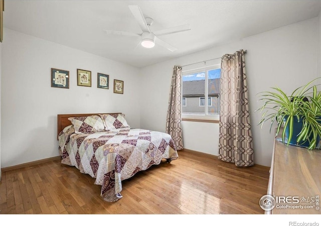 11861 Fairplay St, Commerce City, CO 80603 - bedroom with hardwood / wood-style flooring and ceiling fan