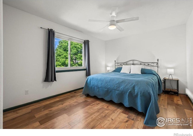 11861 Fairplay St, Commerce City, CO 80603 - bedroom featuring hardwood / wood-style flooring and a ceiling fan