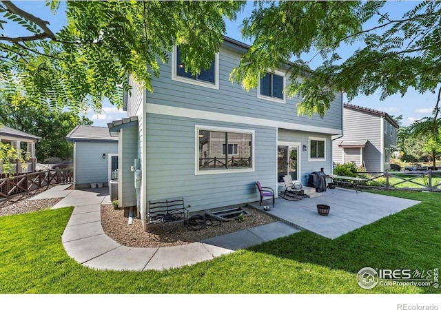 11861 Fairplay St, Commerce City, CO 80603 - rear view of property with a patio
