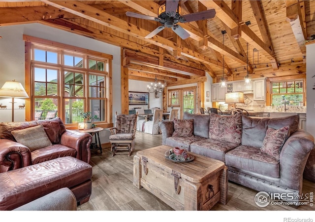 2055 Siskin Dr, Estes Park, CO 80517 - living area featuring wooden ceiling, a chandelier, hardwood / wood-style flooring, and a ceiling fan